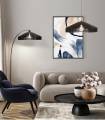 Pour une ambiance chaleureuse et sophistiquée, le lampadaire Calum est idéal