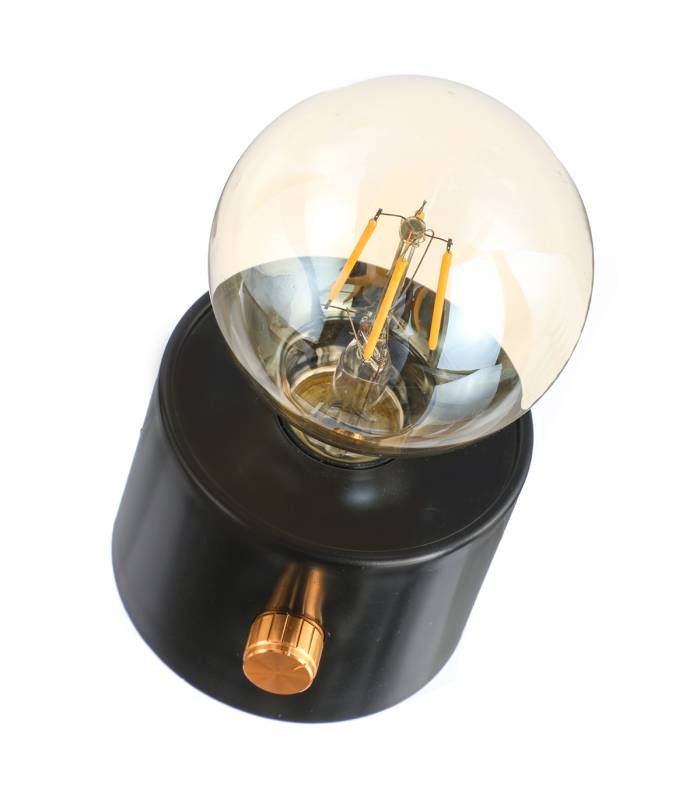 Compacte et pratique, la lampe POPY noire fonctionne sans câble.